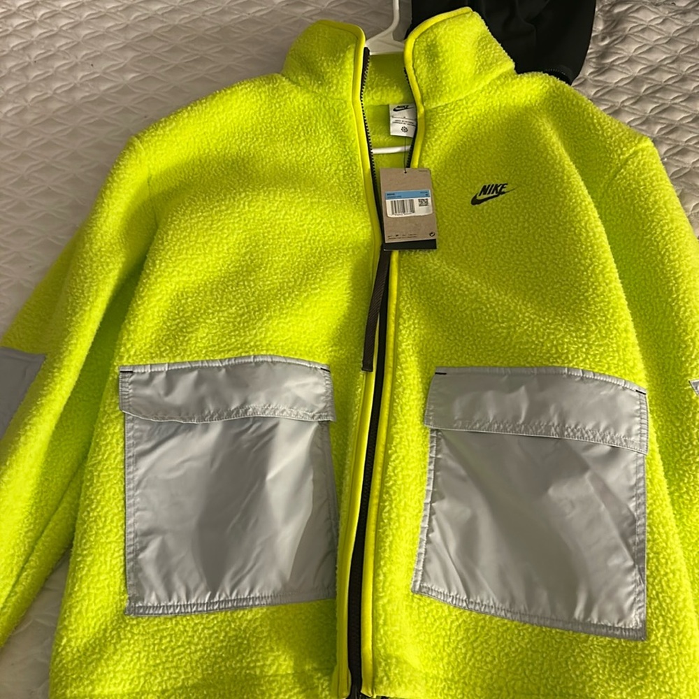 Neon and reflective silver Nike jacket